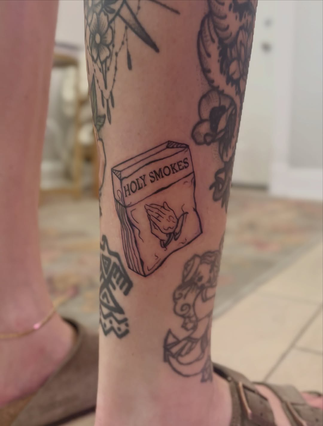Tattoo by @soso.tattoos — lettering_script, blackwork