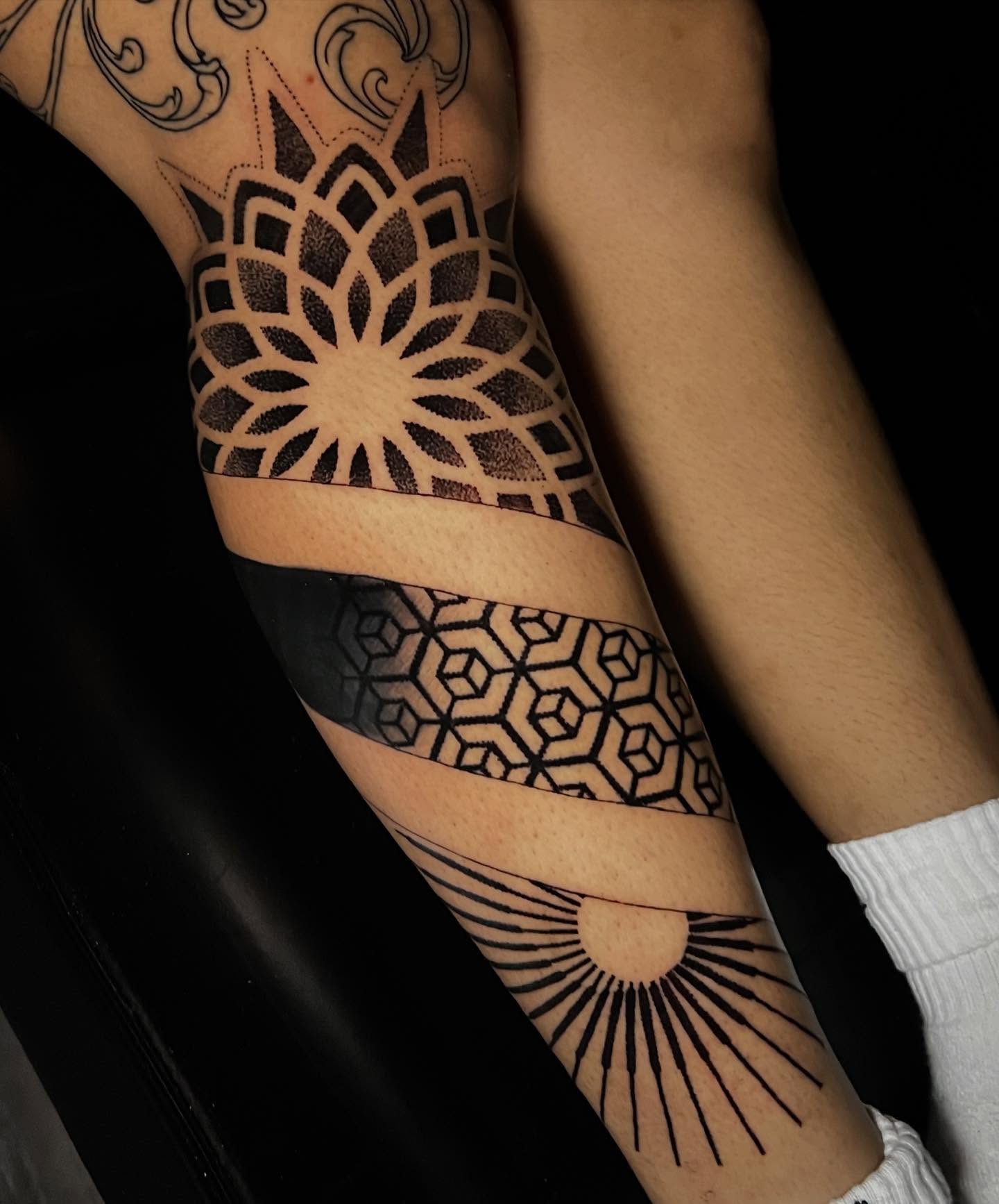 Geometric patterns dotwork tattoo on the forearm by Lord Daniel Serna