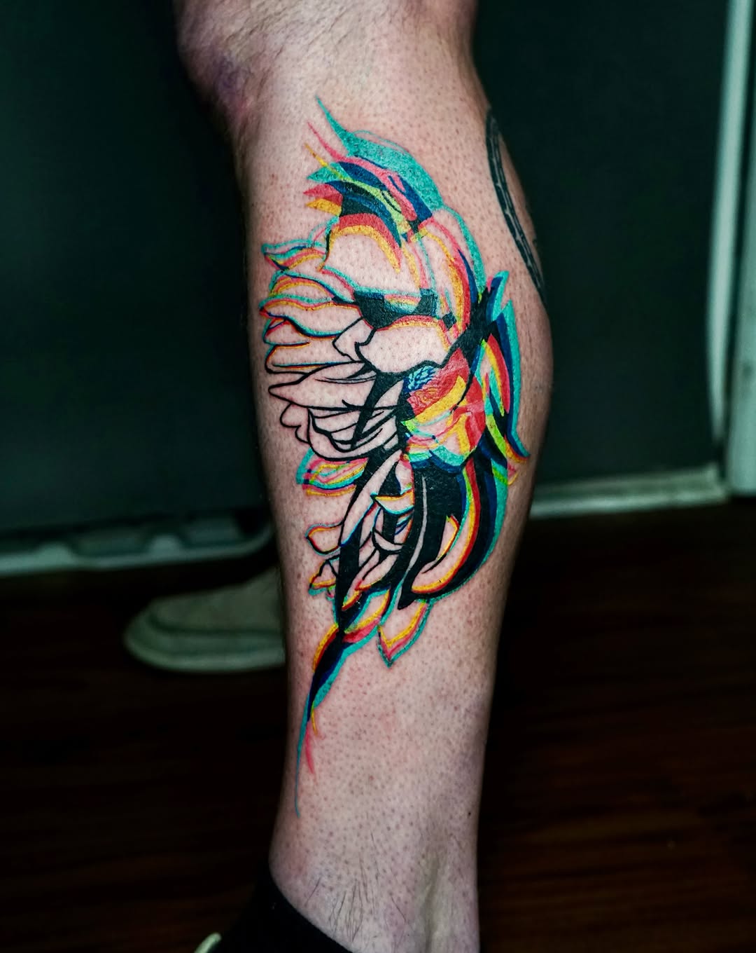 Lion watercolor tattoo on the leg by Nyahzul - Glitch Tattoo Artist NYC
