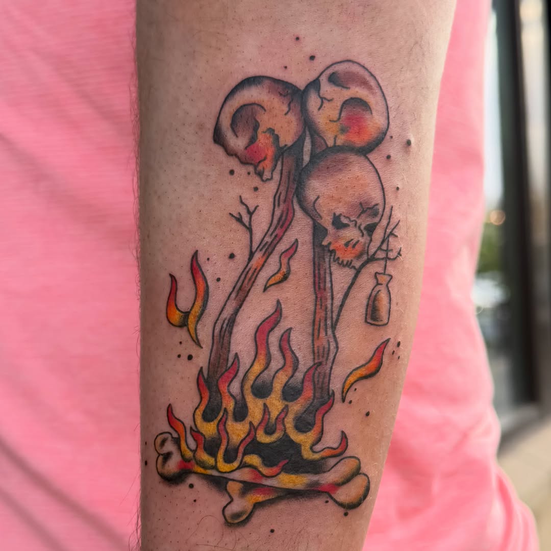 Skull and mushrooms dotwork tattoo on the forearm by Kieara West