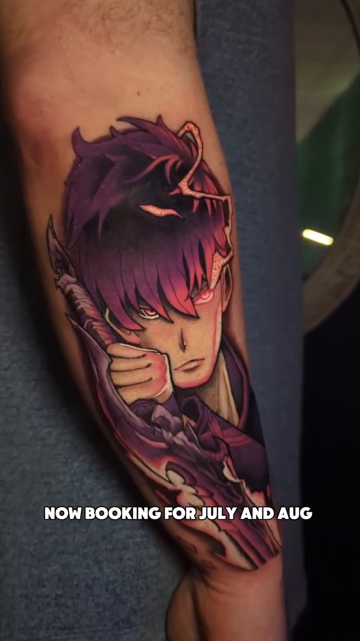 Anime character portrait anime tattoo on the upper arm by Narnia Gallagher