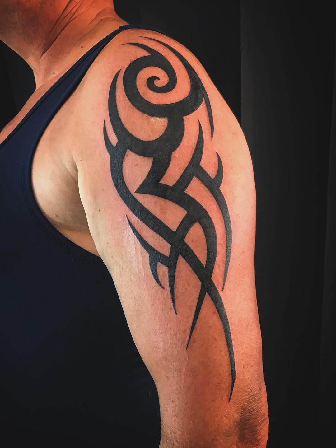 Tribal design tribal tattoo on the shoulder by Moss Quito Tattoo