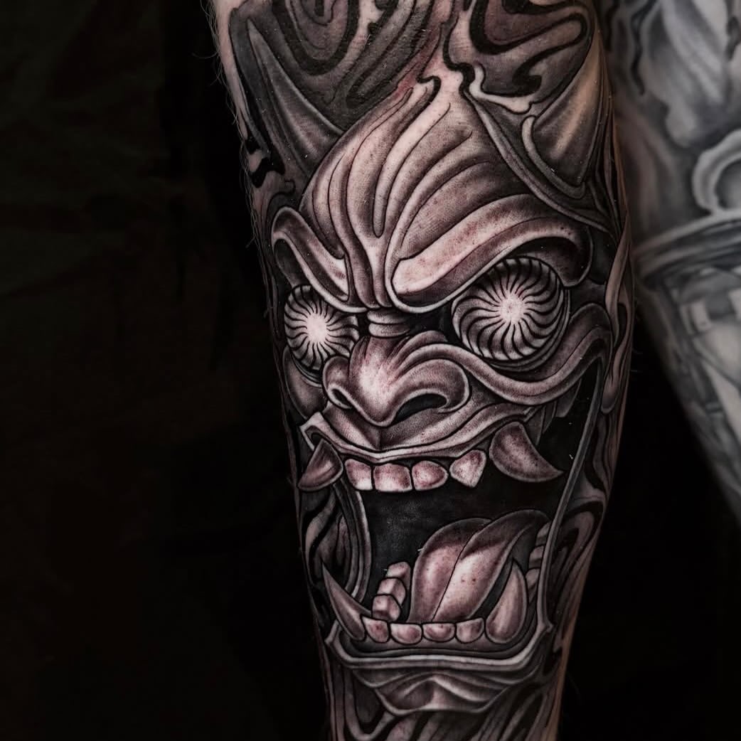Oni mask Japanese tattoo on the forearm by Elidia Veliz