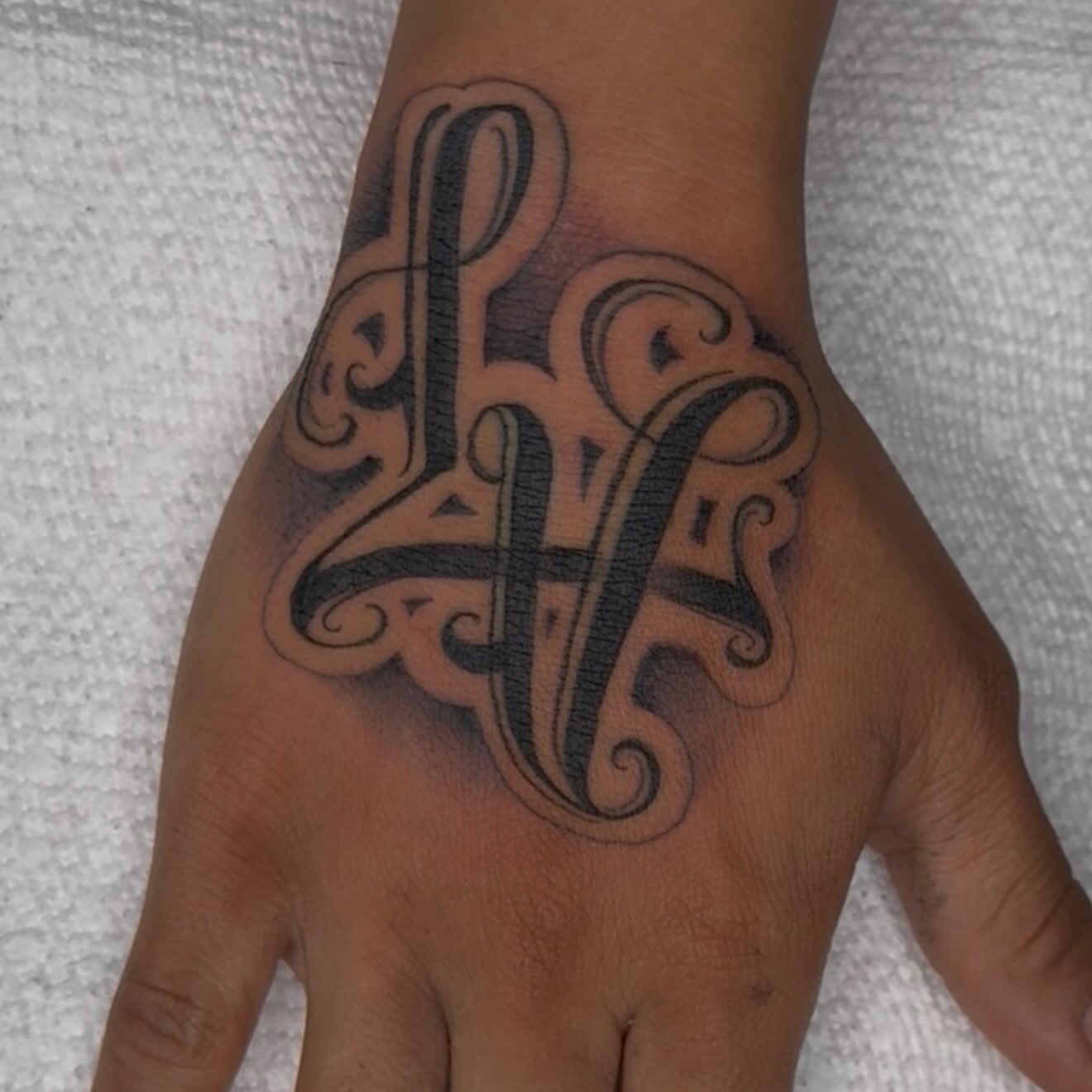 Tattoo by @adawgg_tattoos — lettering_script