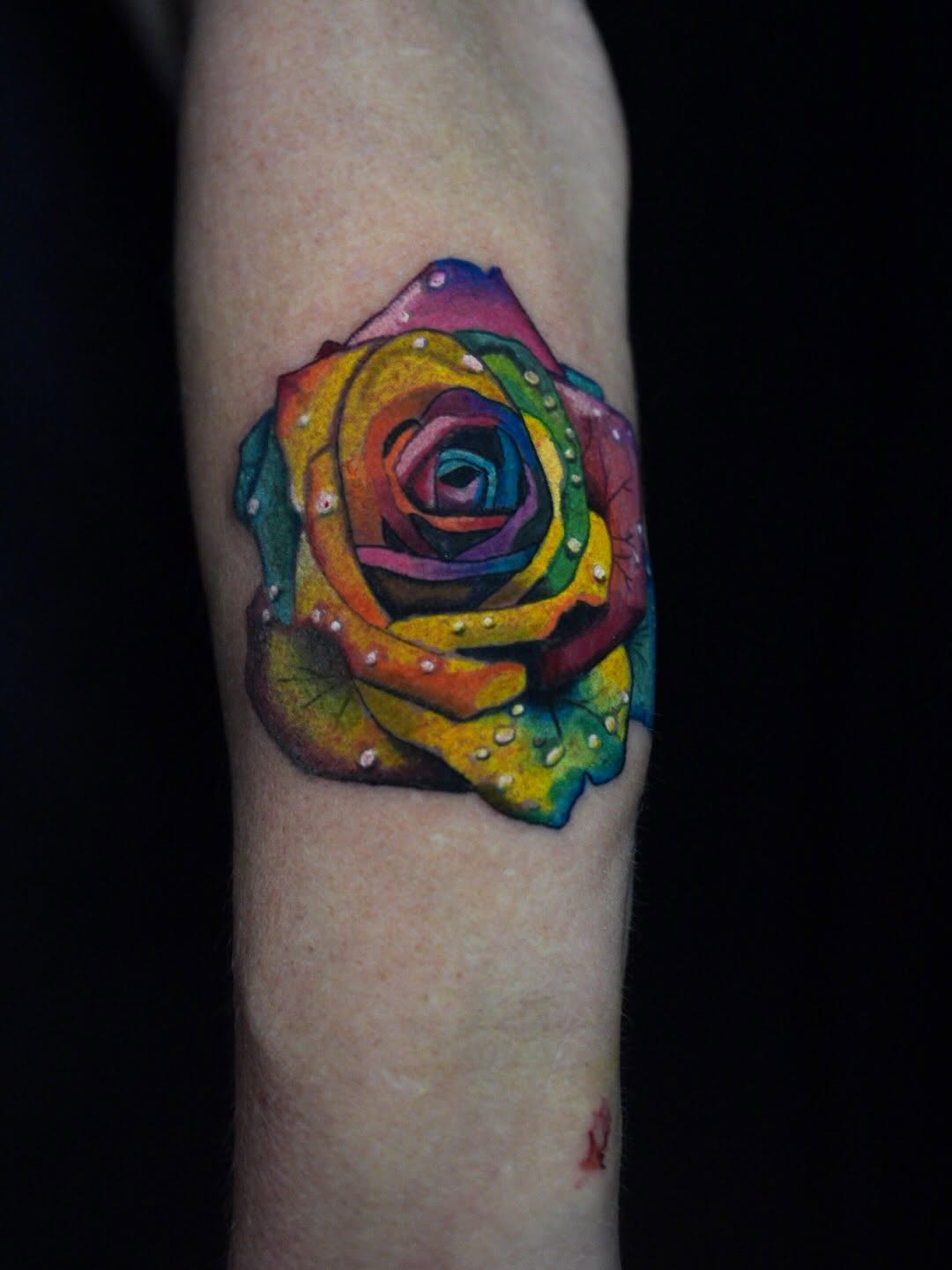 Tattoo by @rayvin_tattoos — realism, watercolor