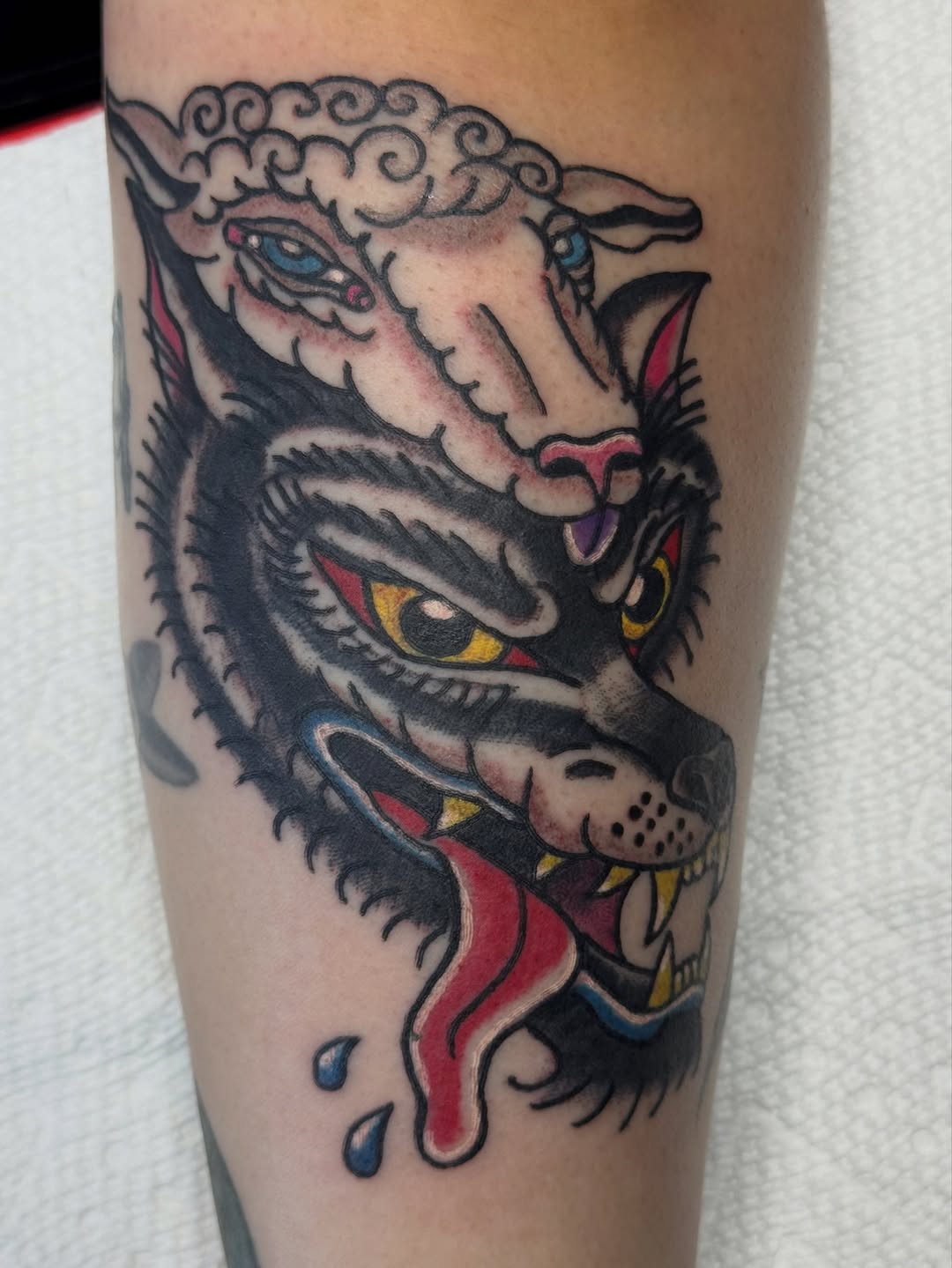 Wolf and sheep head realism tattoo on the forearm by 🌛 𐌀𐌋𐌄𐋄𐌉𐌔 🌜