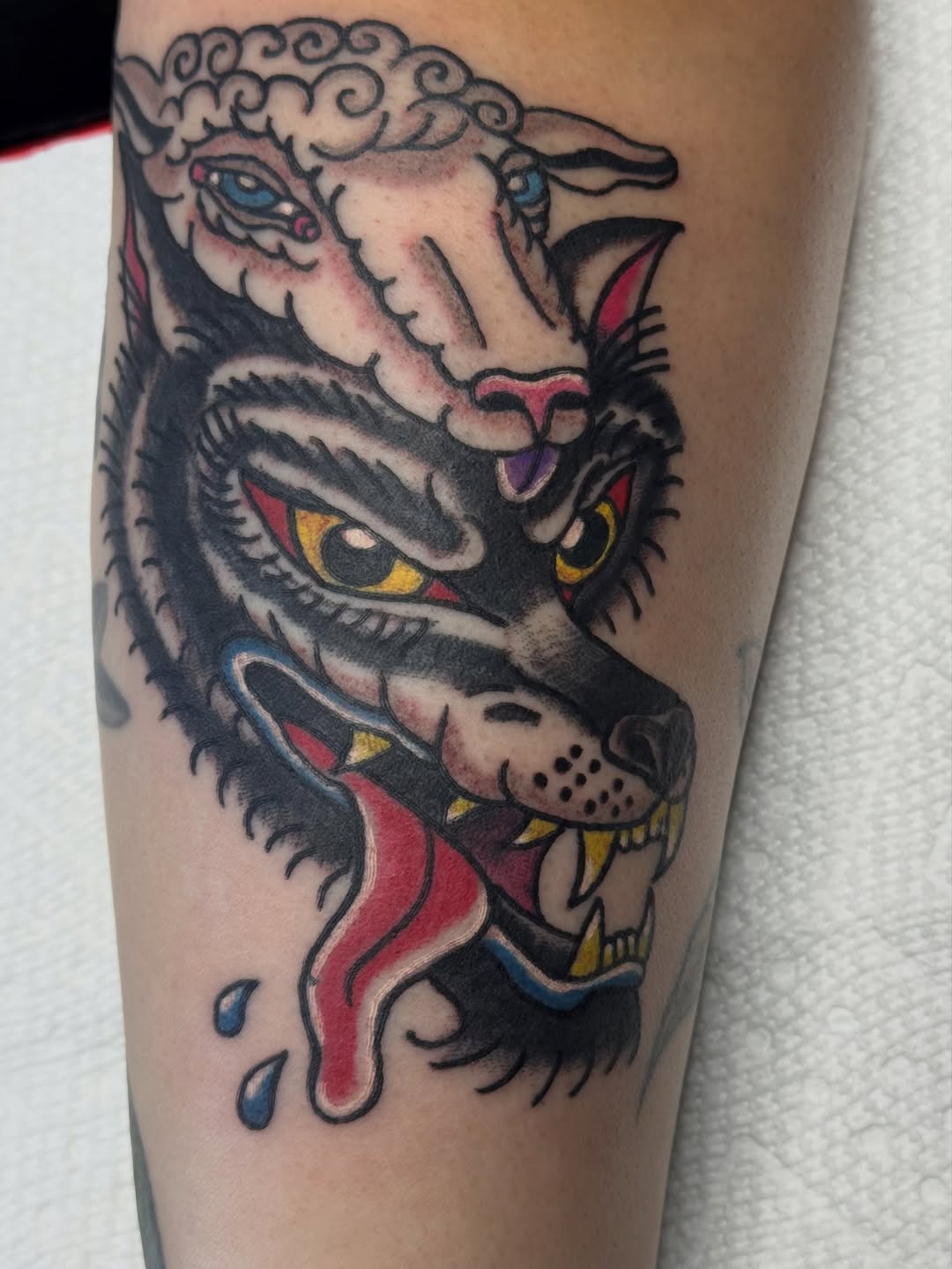 Wolf wearing a sheep mask neo-traditional tattoo on the forearm by 🌛 𐌀𐌋𐌄𐋄𐌉𐌔 🌜