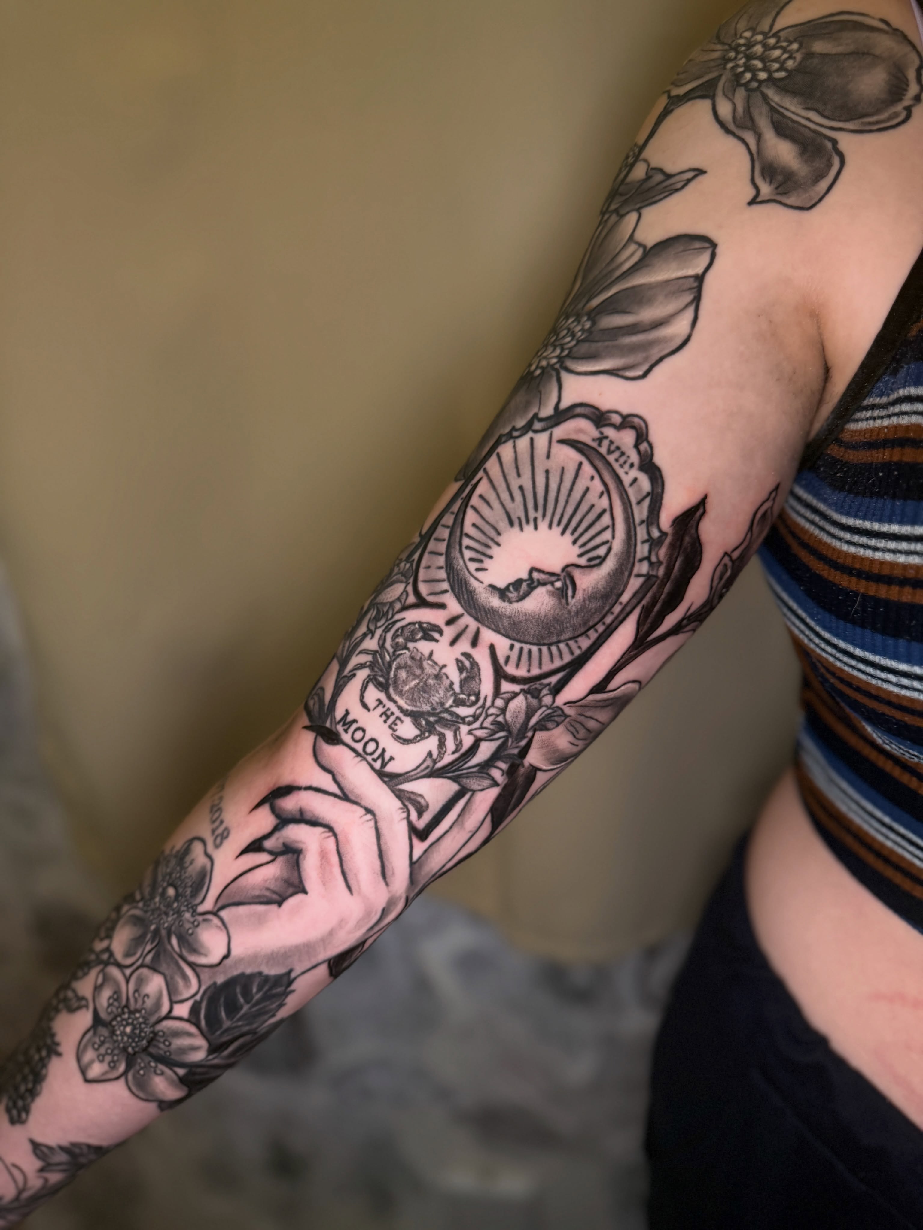 Moon and flowers black and grey tattoo on the forearm by ❈°binx°❈