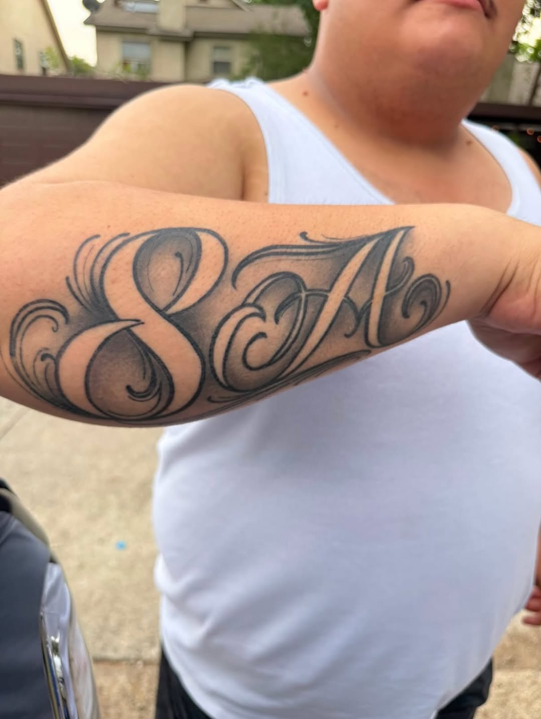 SA lettering lettering tattoo on the forearm by Dallas tx tattoo artist ✝️