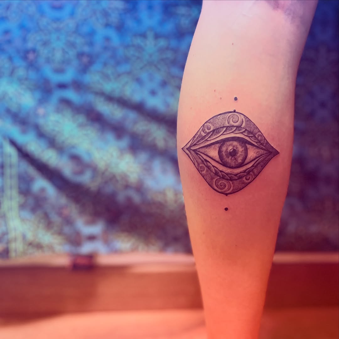 Eye with ornamental details dotwork tattoo on the forearm by La Main Bleue