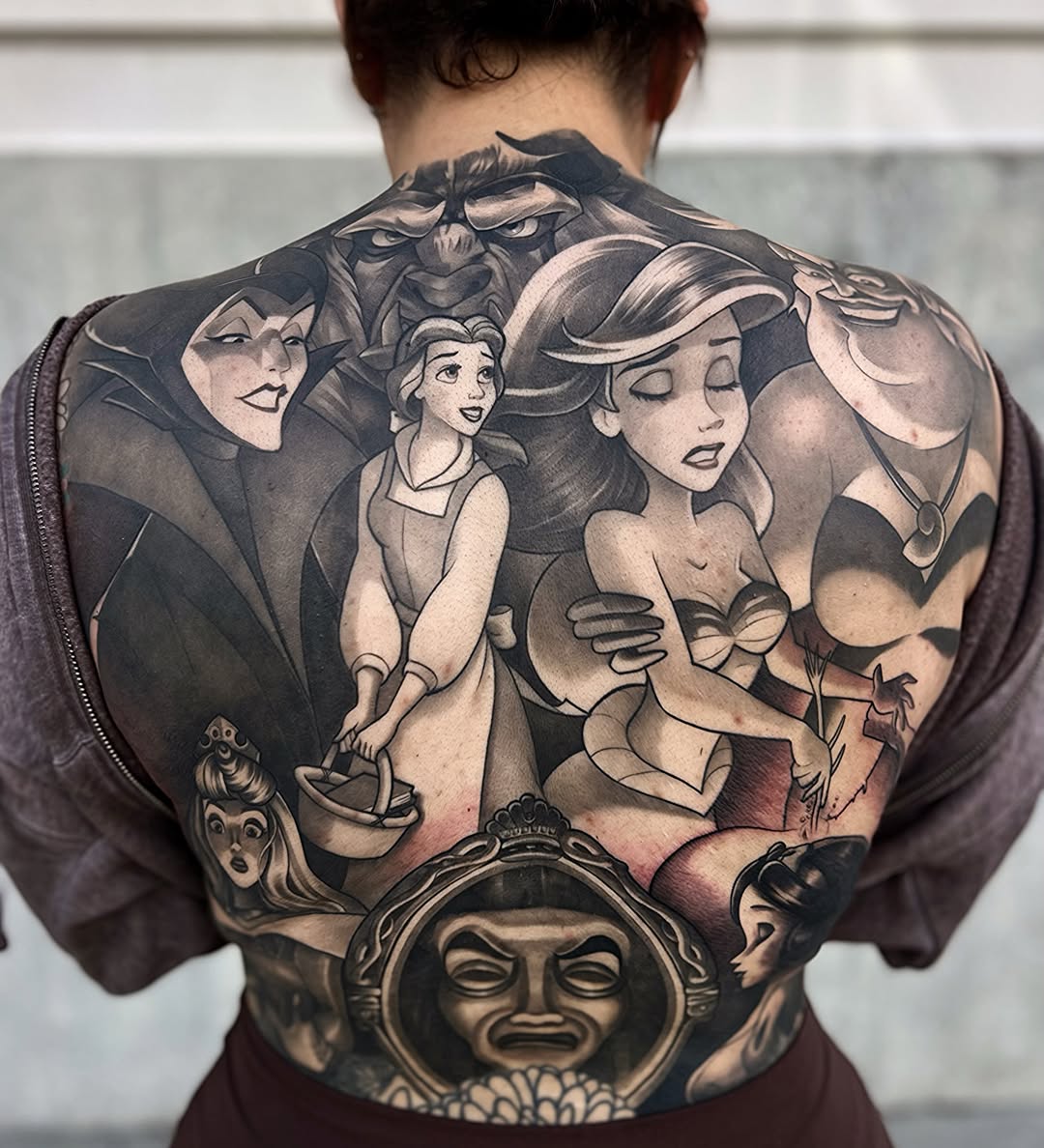Disney princesses black and grey tattoo on the back by Tattoos by Anthony Davis