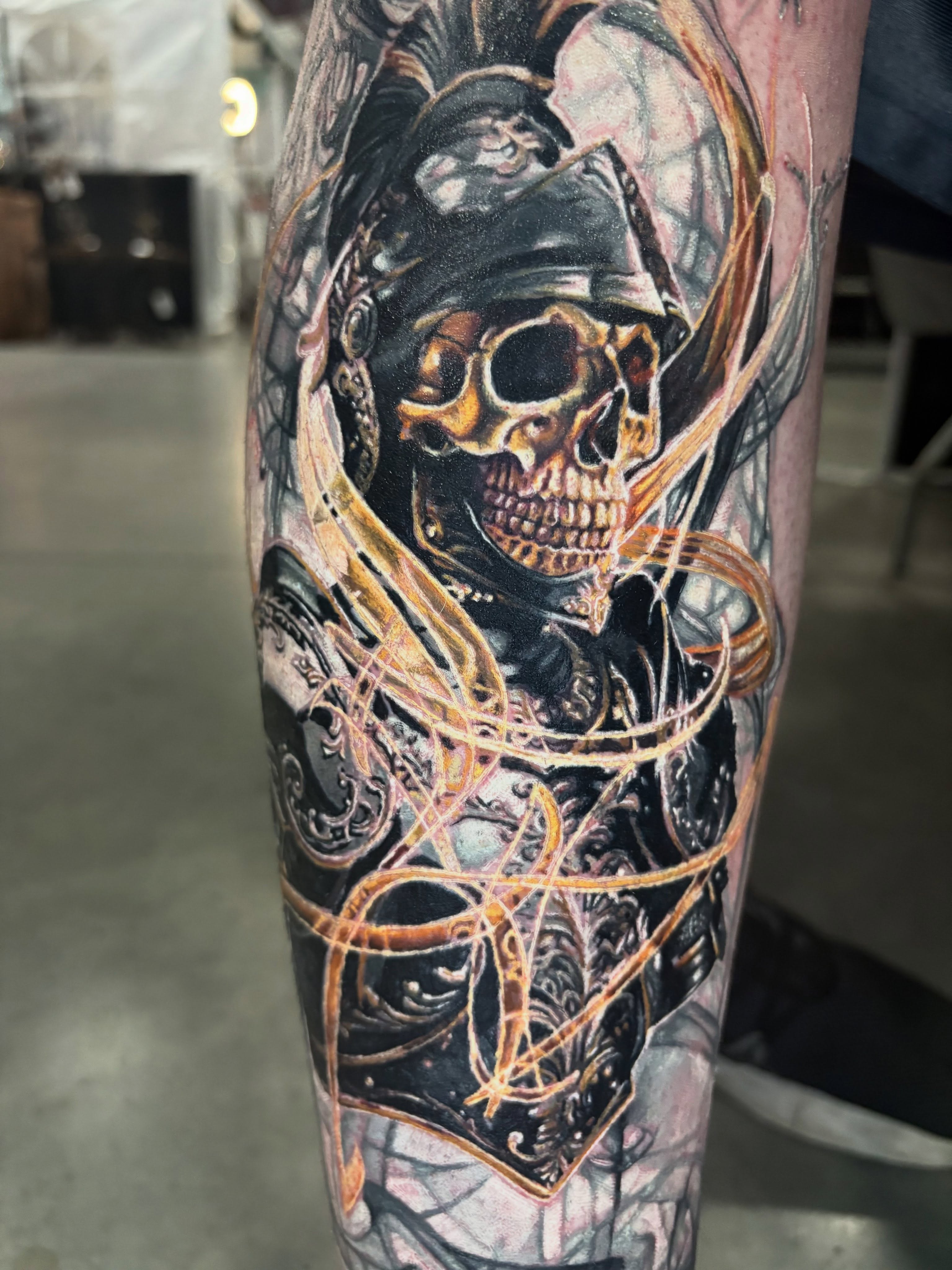 Skull in armor realism tattoo on the forearm by Jacee Hamilton