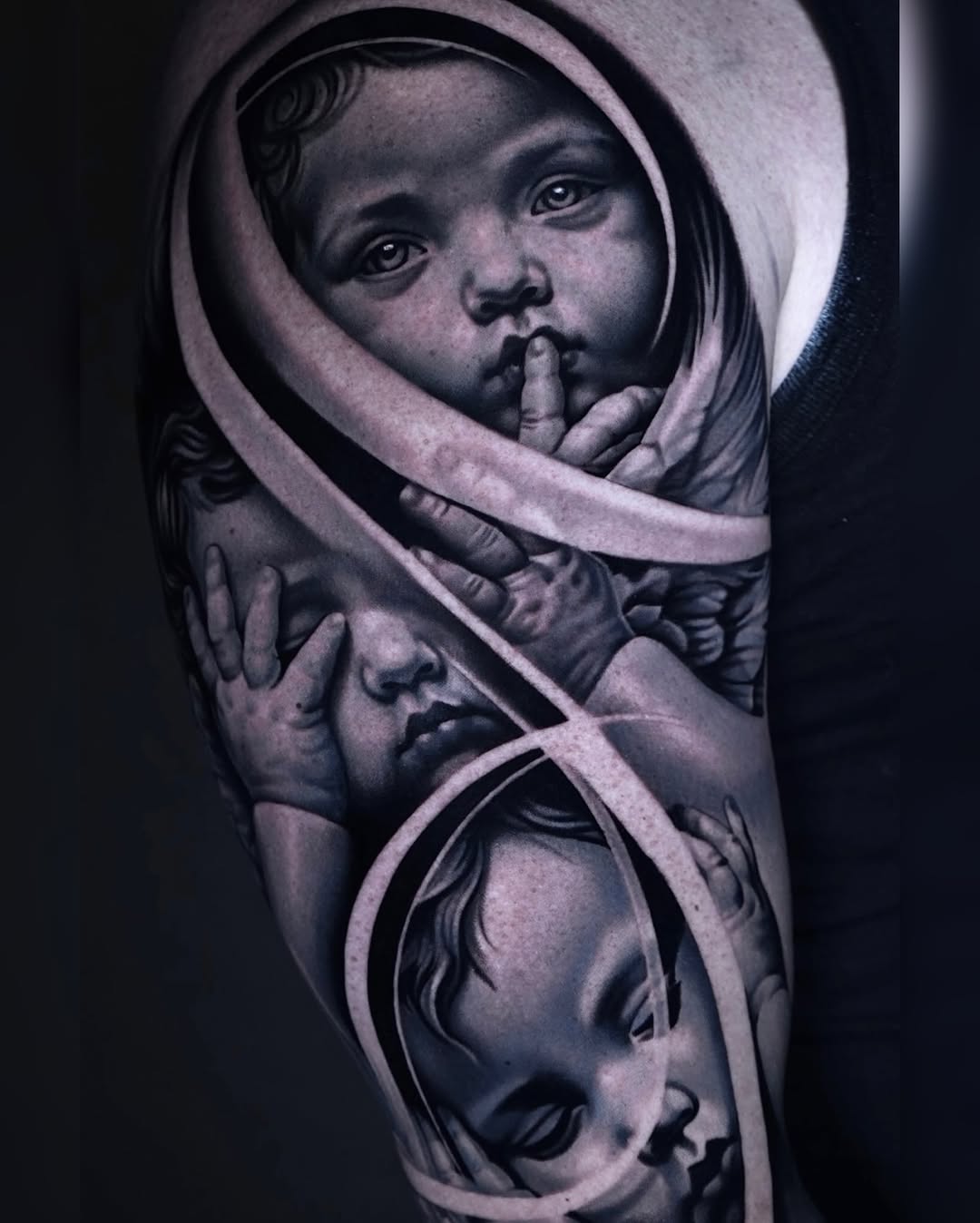 Cherubs realism tattoo on the forearm by Sadier Alfonso