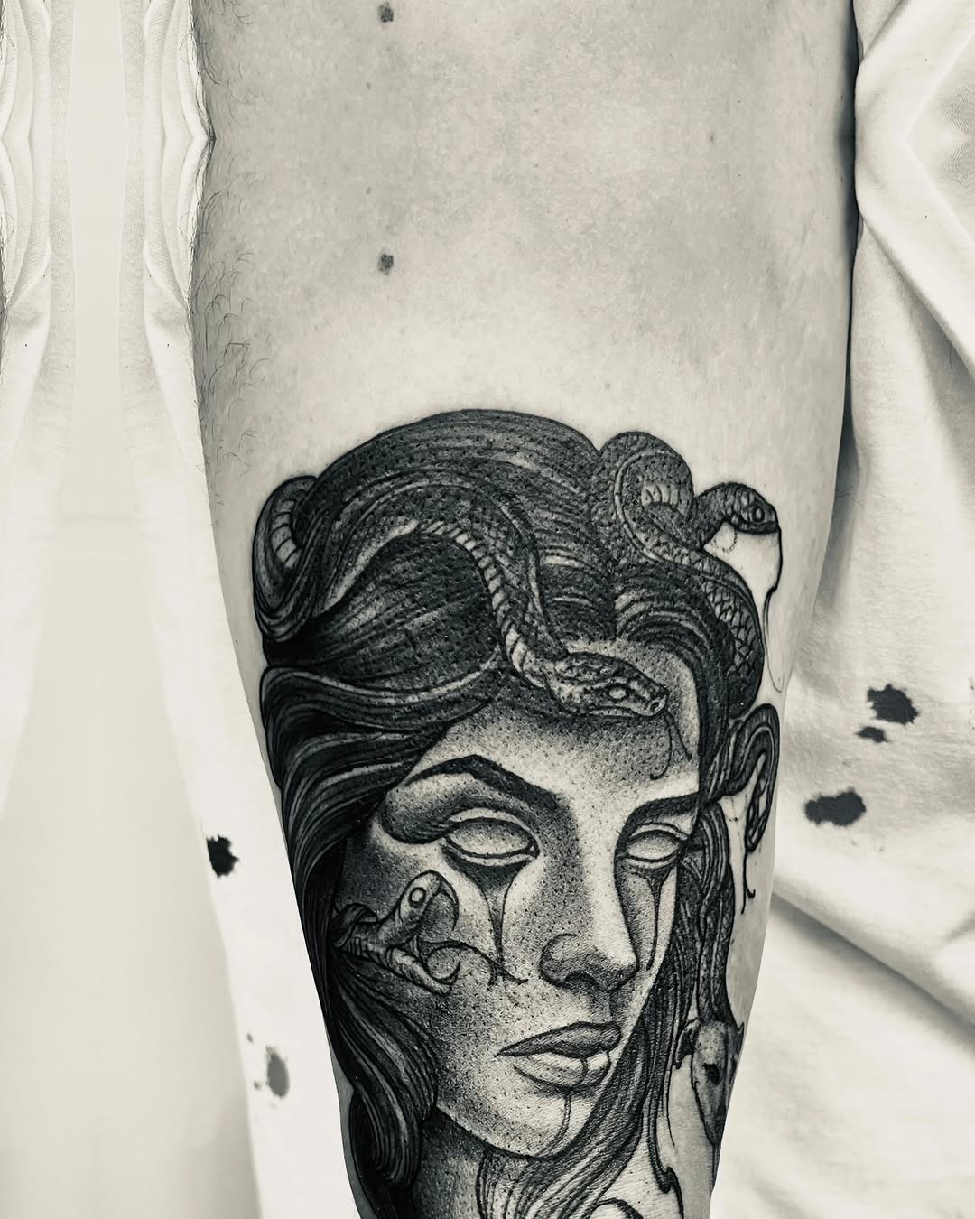 Medusa portrait with snakes realism tattoo on the forearm by Watson Gutkowski