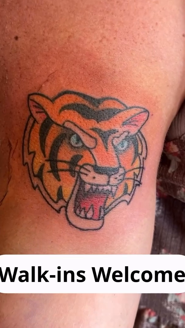 Tiger head realism tattoo on the forearm by Cortney "Fett" Fettinger, Fort Wayne, Indiana