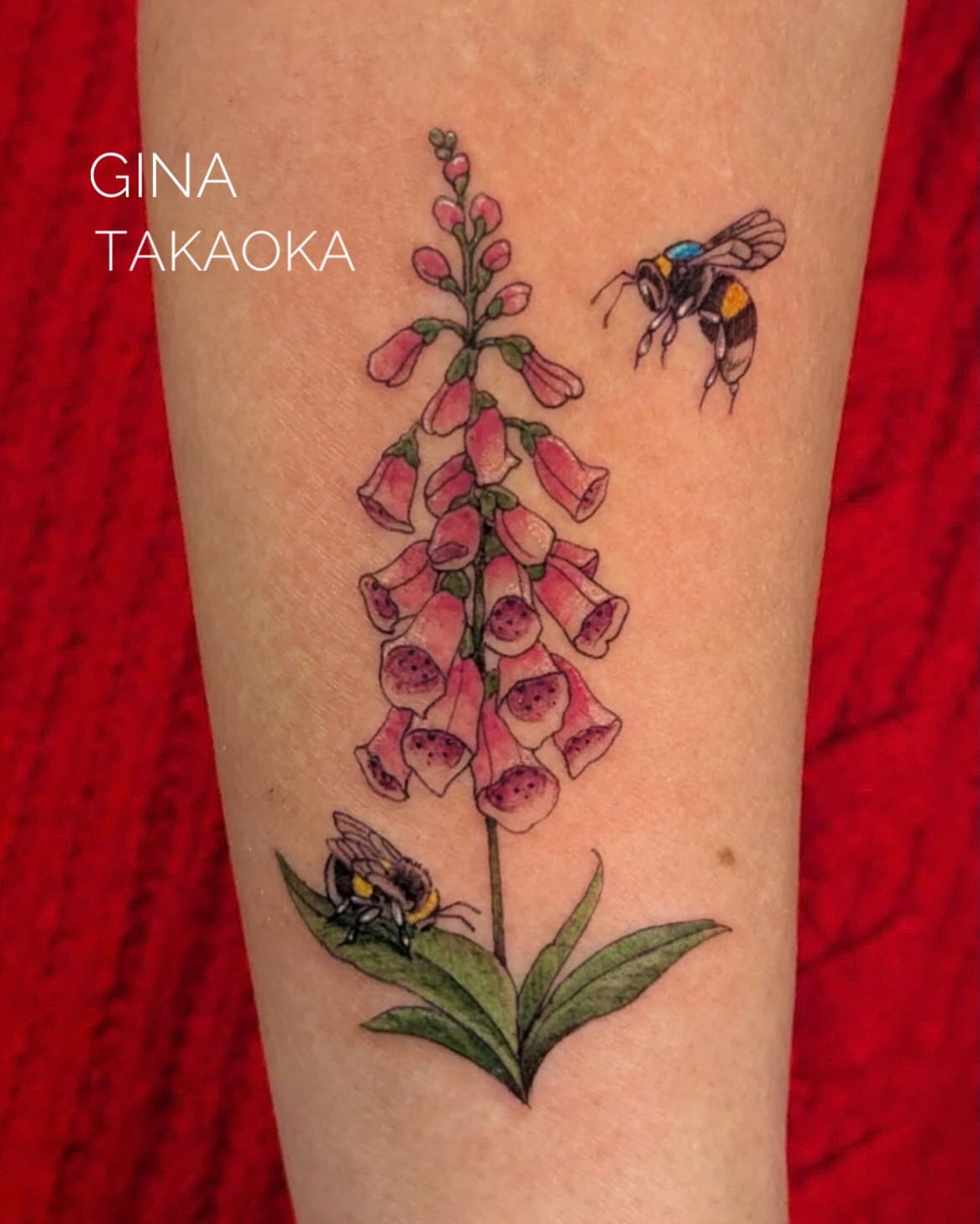Foxglove and bee realism tattoo on the forearm by AJ Jensen