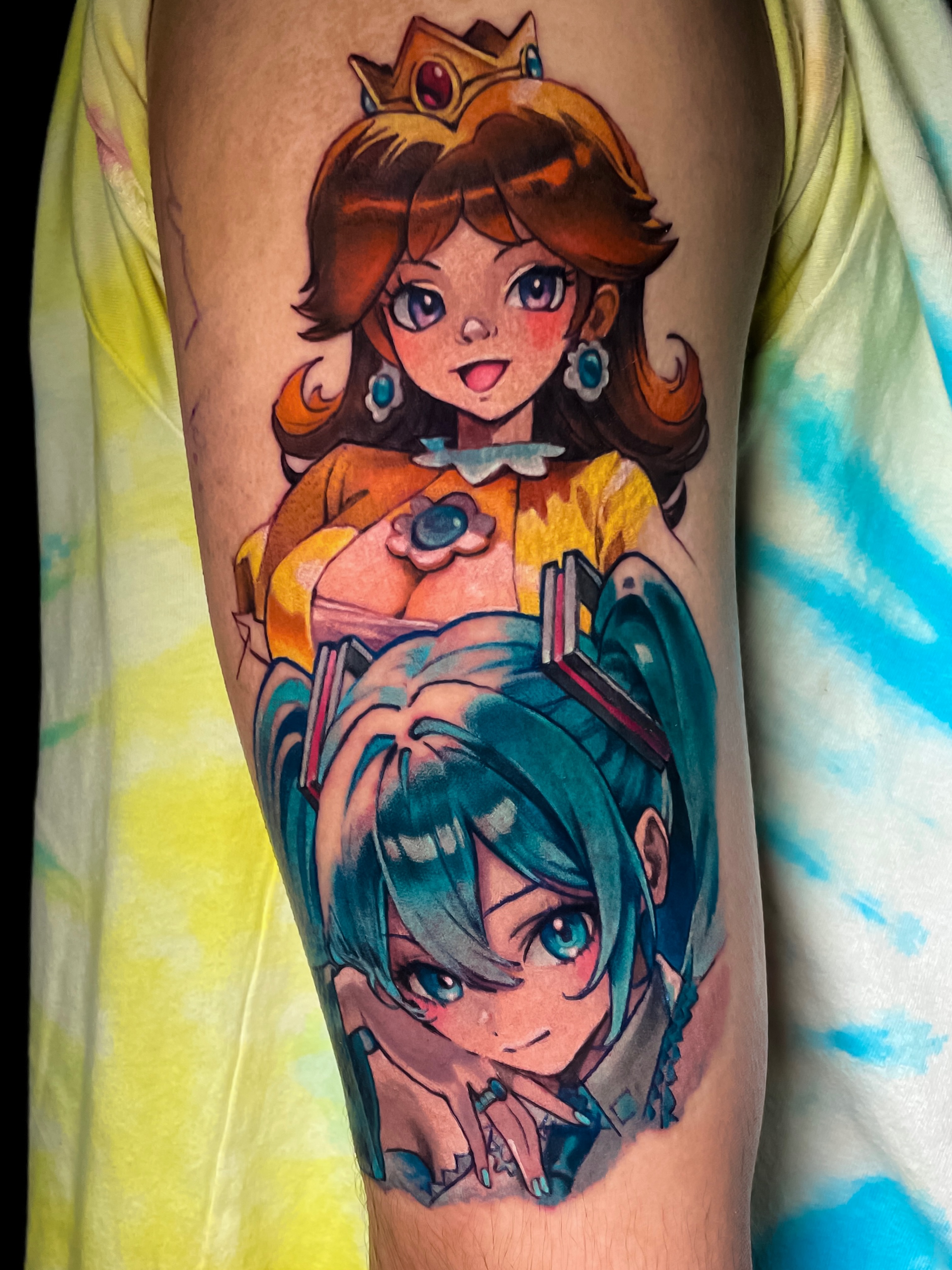 Anime characters anime tattoo on the forearm by Tattoo artist in Seattle, WA