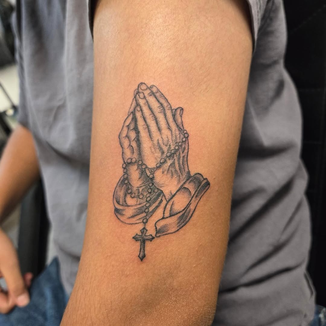 Praying hands with rosary and cross Chicano tattoo on the forearm by Jose G. Rubio Tattoo Artist πΊπ²ππ¨π¦