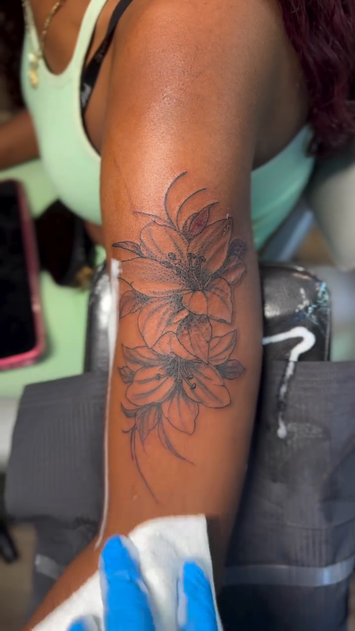 Floral tattoo on arm fine line tattoo on the forearm by Charlotte Tattoo Artist💉