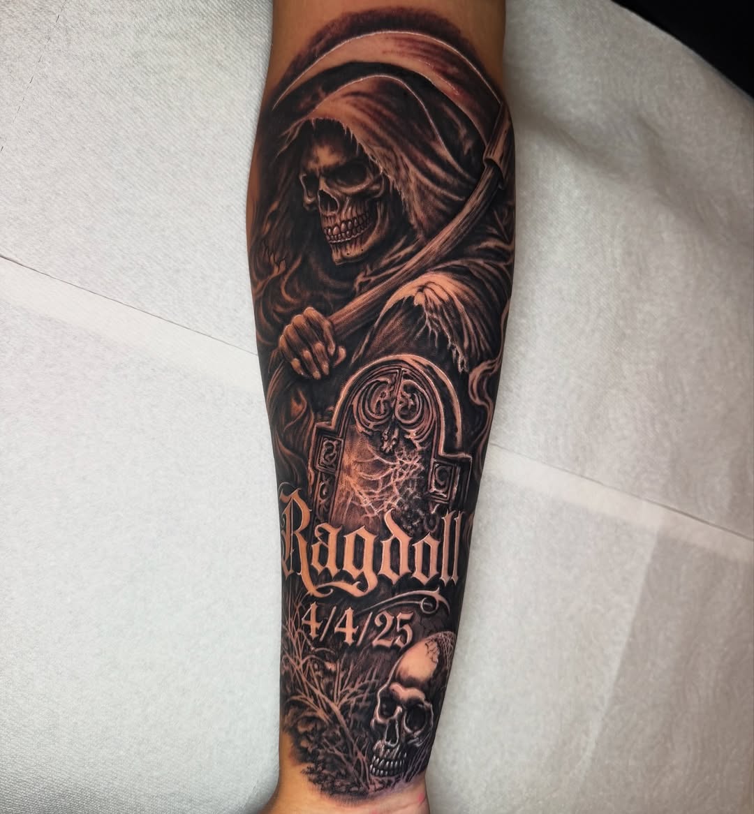 Grim reaper and tombstone realism tattoo on the forearm by Anthony Ramirez