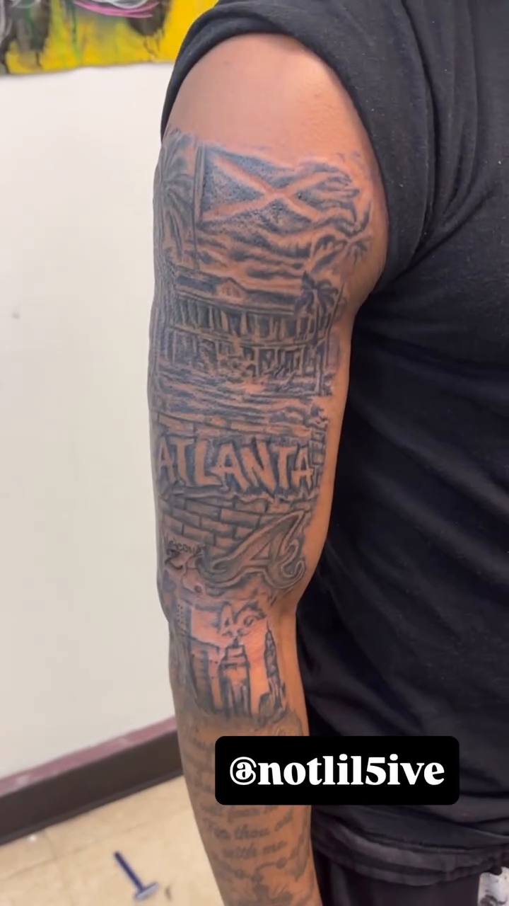 Atlanta skyline and text tattoo Chicano tattoo on the forearm by Exotic Motion🌪️