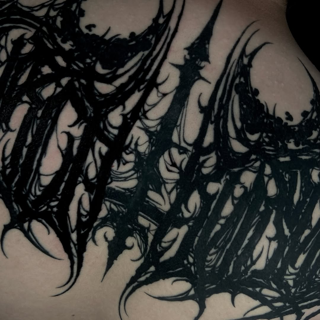Tattoo by @baptism_black โ lettering_script, blackwork