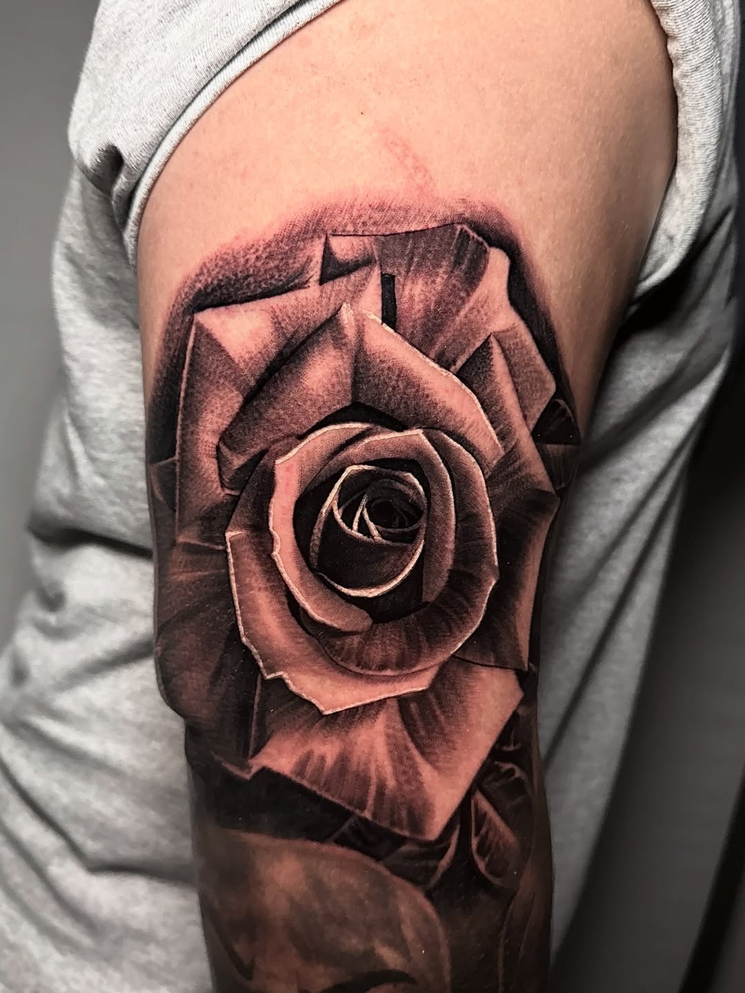 Tattoo by @tattoo_isaac562 — realism, black_and_grey