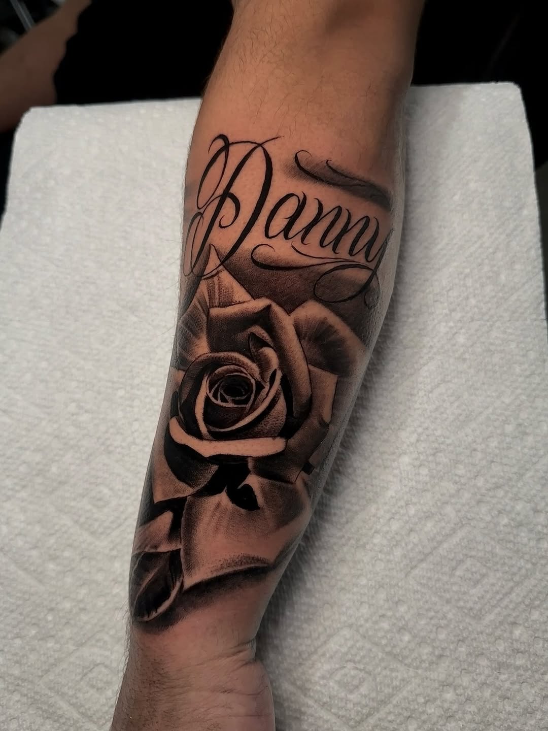 Tattoo by @tattoo_isaac562 — lettering_script, realism