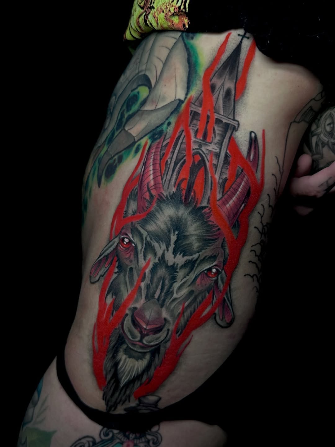 Goat head with flames and church dark art tattoo on the shoulder by 𝐀𝐮𝐬𝐭𝐢𝐧 𝐌𝐨𝐫𝐫𝐢𝐬𝐨𝐧 𝐓𝐚𝐭𝐭𝐨𝐨𝐬