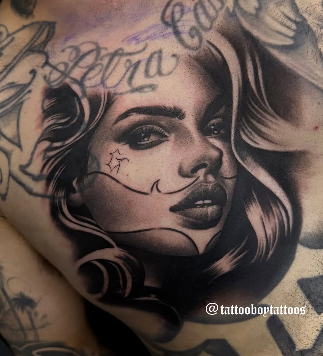 Portrait of a woman Chicano tattoo on the chest by TattooBoyTattoos