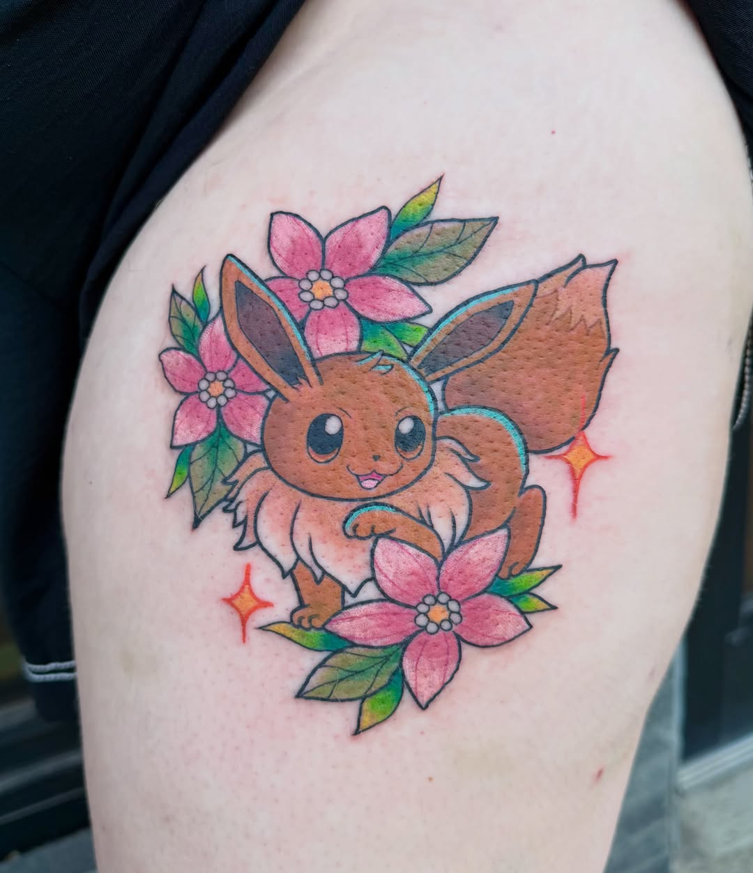 Eevee from Pokemon with flowers new school tattoo on the thigh by Bri ⚡️✨