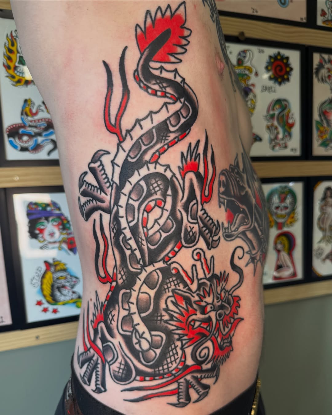 Dragon American traditional tattoo on the thigh by Tyler