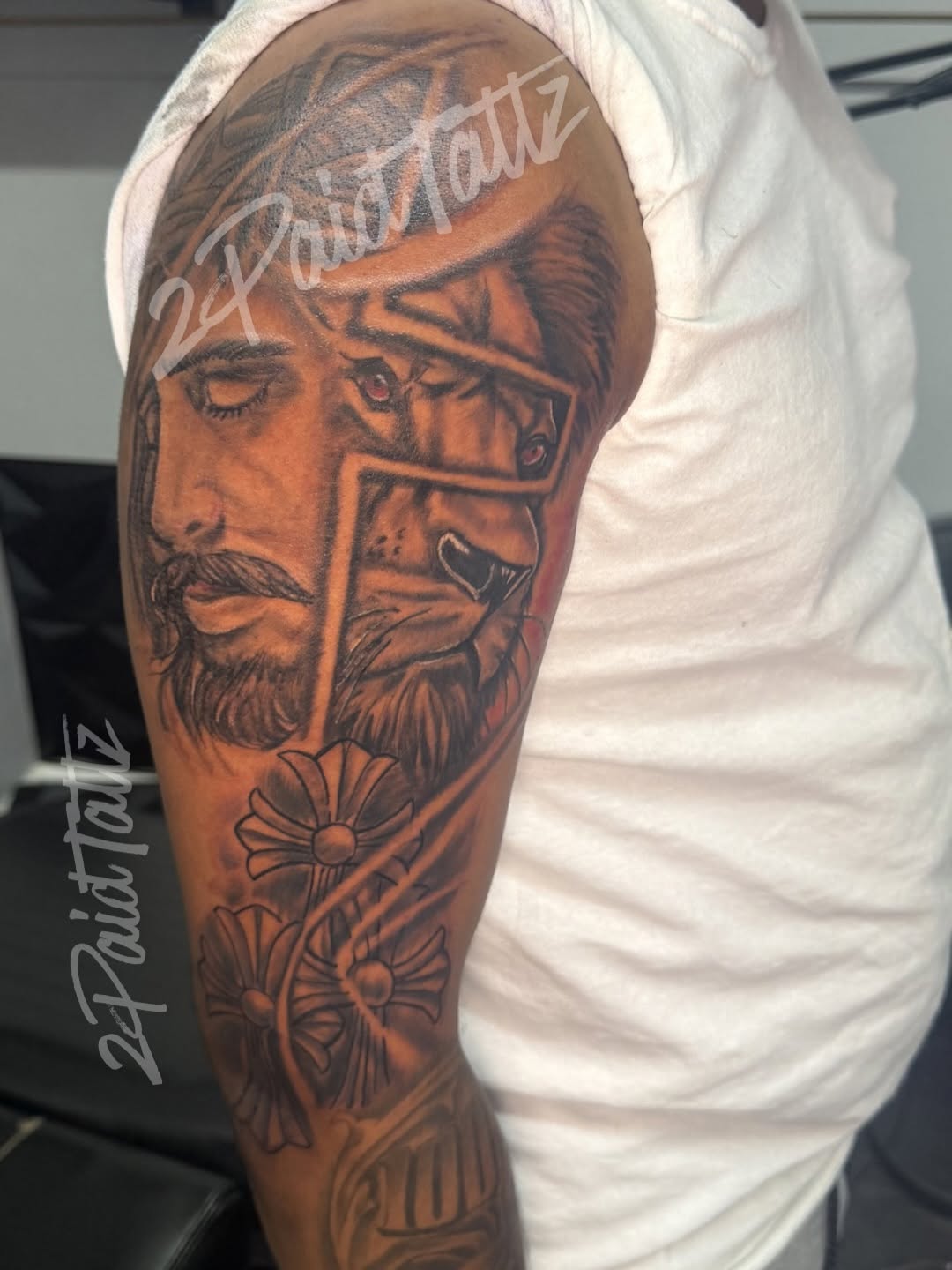 Jesus and lion portrait with flowers Chicano tattoo on the forearm by 2PaidTattz
