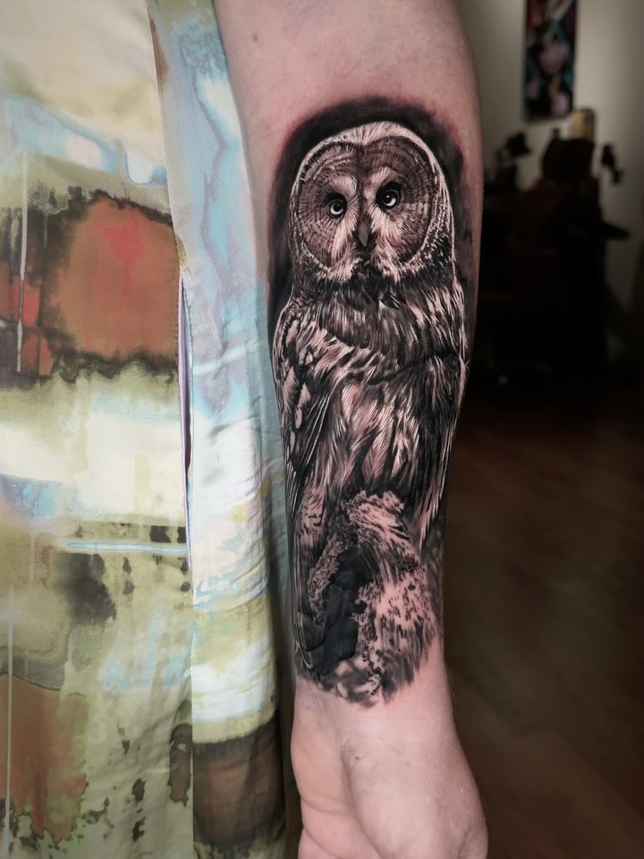 Owl portrait fine line tattoo on the forearm by angel.antonio.tattoos