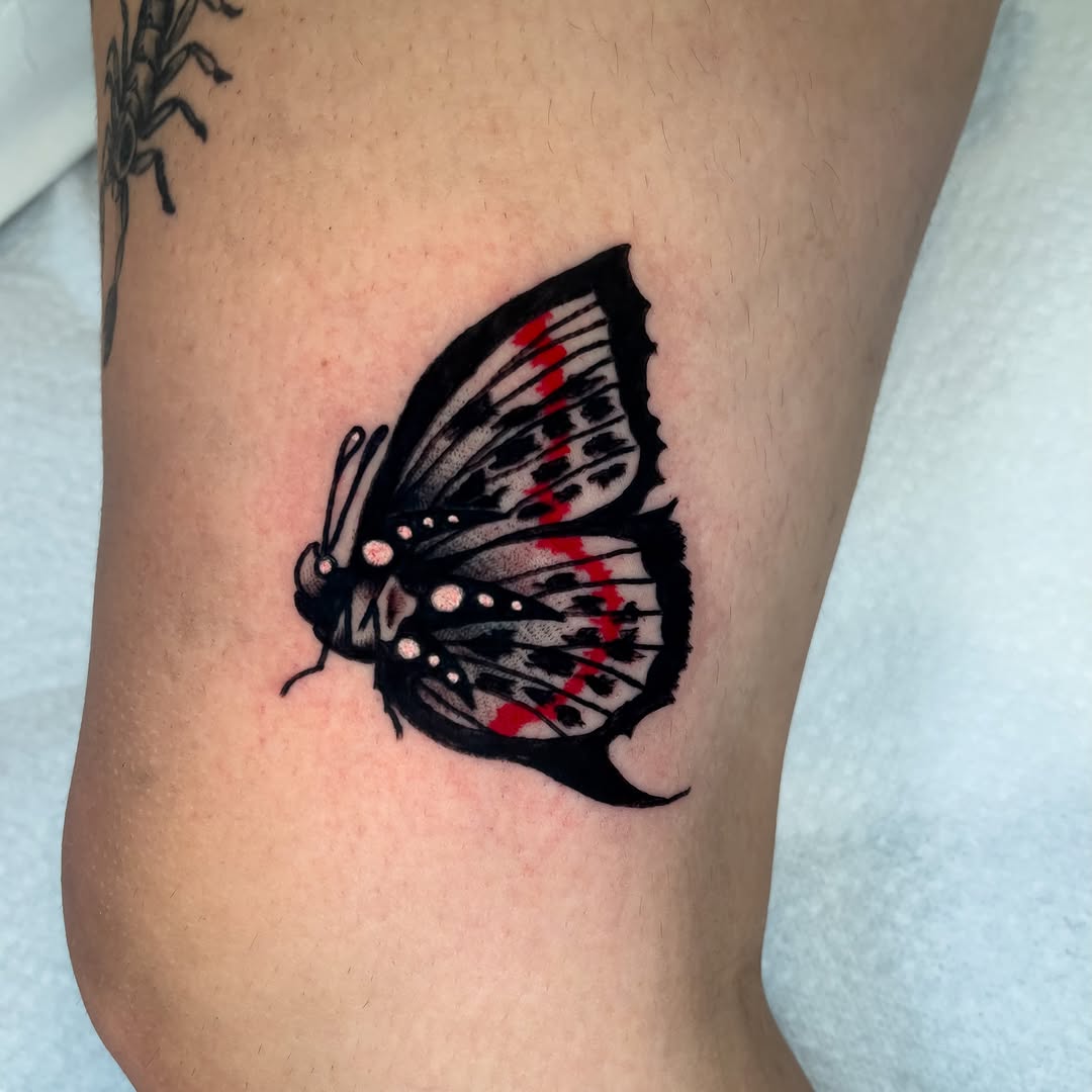 Butterfly fine line tattoo on the forearm by Devyn Hightower
