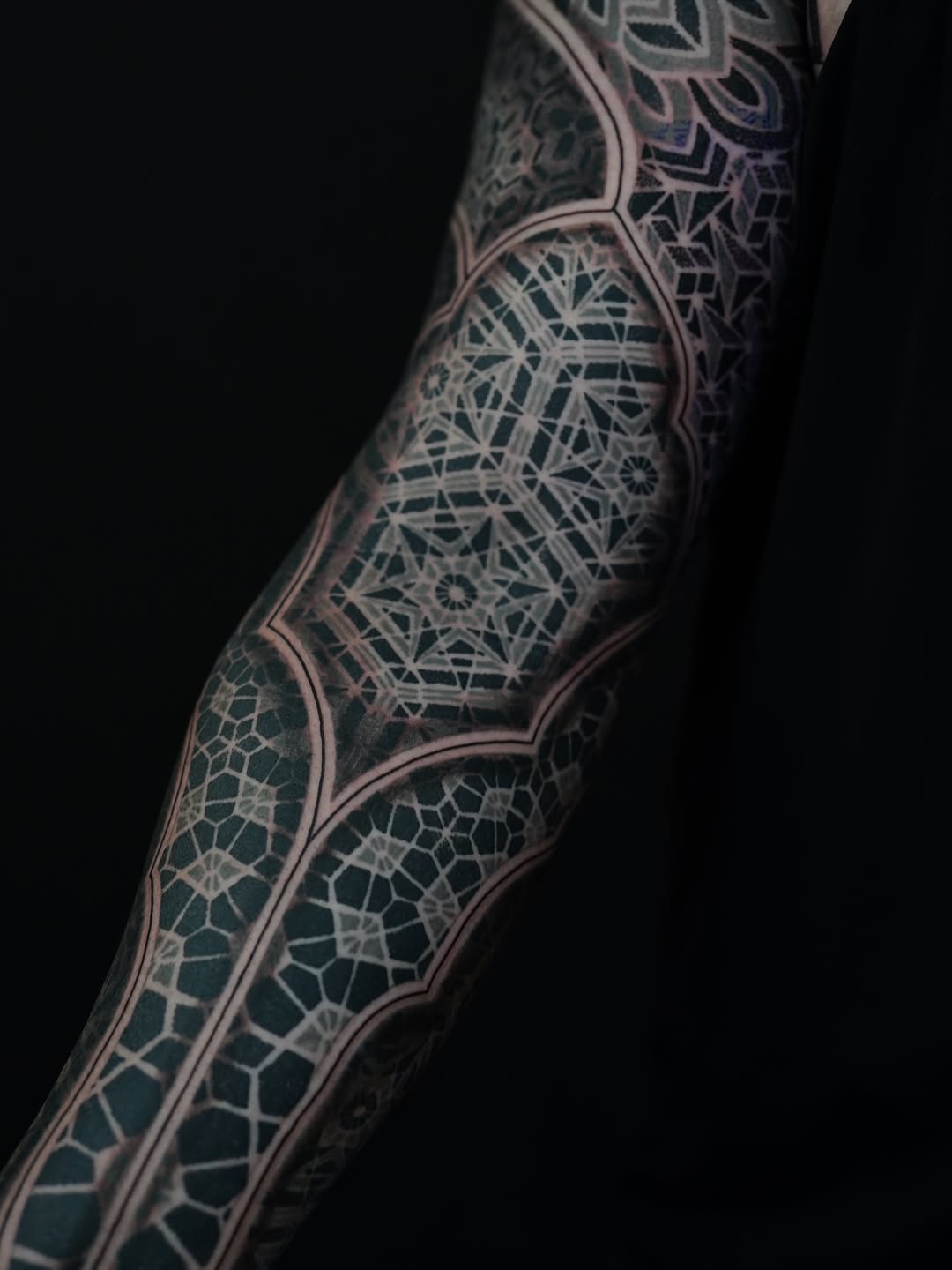 Geometric pattern sleeve geometric tattoo on the forearm by Oliver kenton, San Diego, California