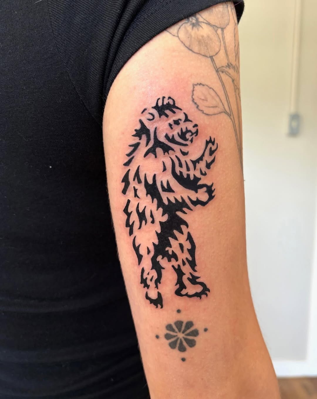 Bear dotwork tattoo on the forearm by M