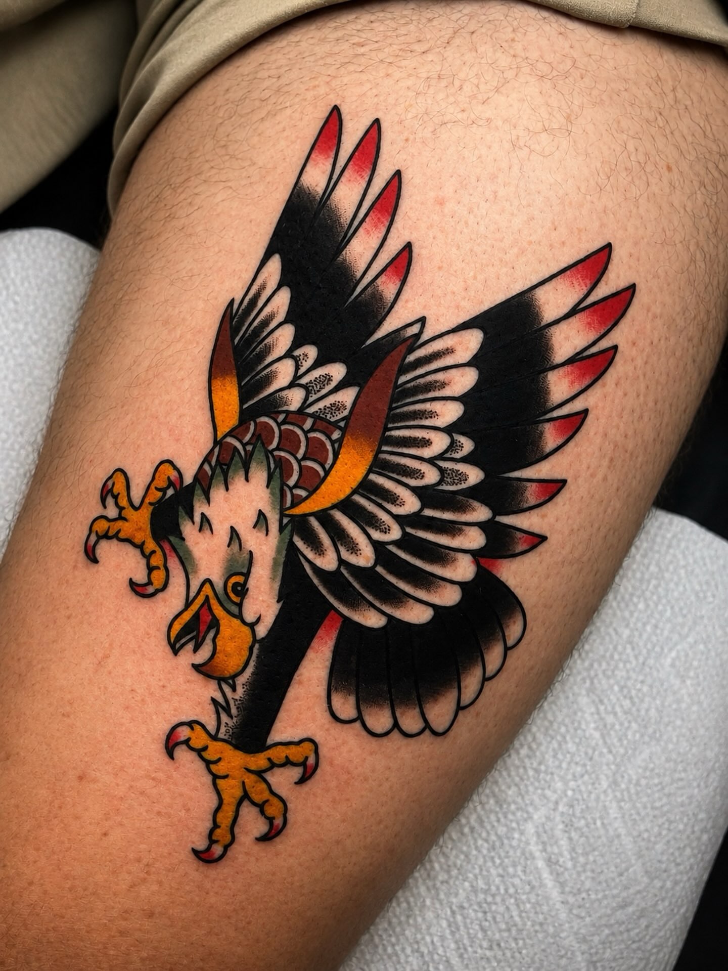 Eagle American traditional tattoo on the thigh by Todd Showdown
