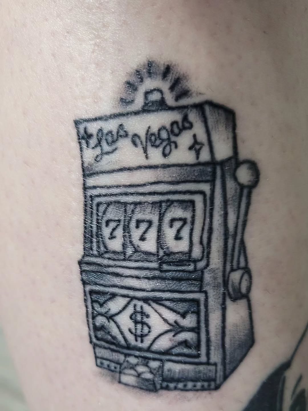 Slot machine tattoo on the forearm by Peach & Poke, Lethbridge, Alberta