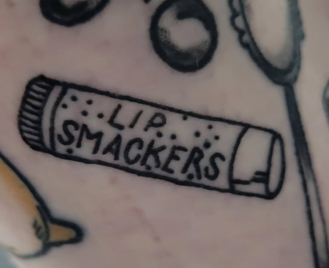 Lip Smackers lip balm tube tattoo by Peach & Poke, Lethbridge, Alberta