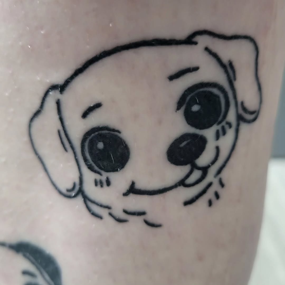 Dog face realism tattoo on the forearm by Peach & Poke, Lethbridge, Alberta