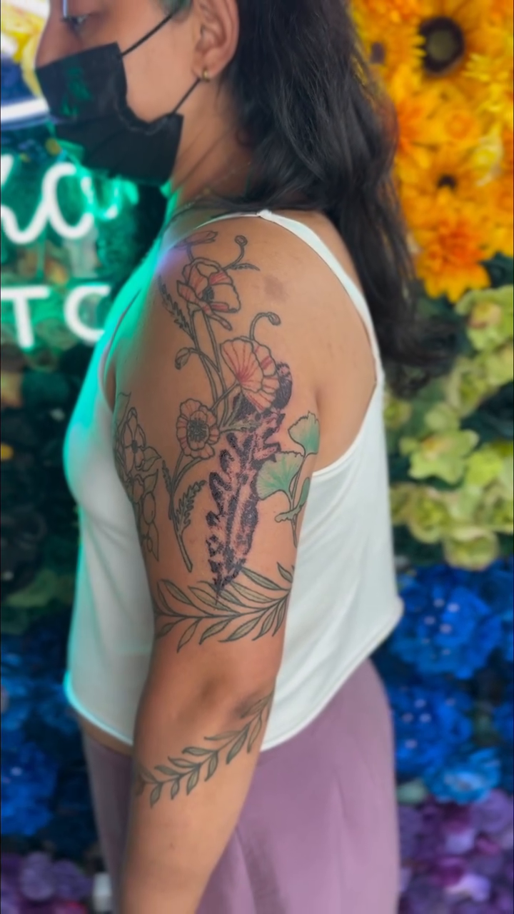 Floral and botanical sleeve watercolor tattoo on the upper arm by Handpoke Tattoo Artist, Minneapolis, Minnesota