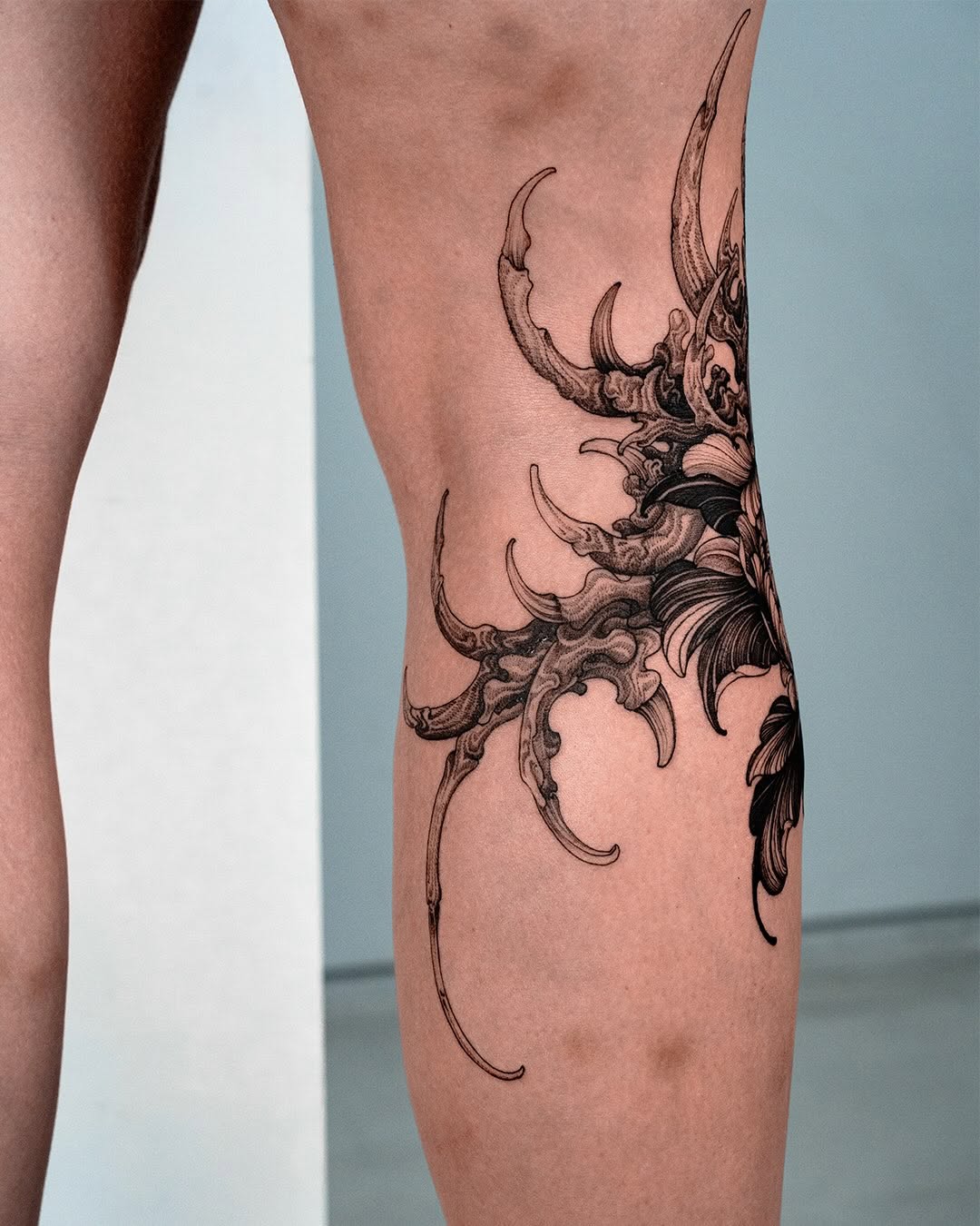 Tattoo by @siio_ink — black_and_grey, dark_realism