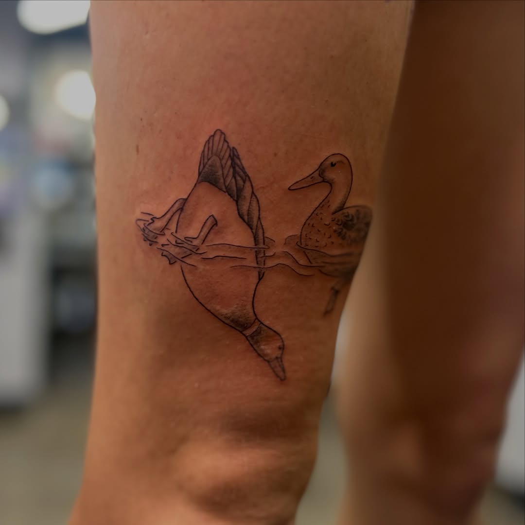 Ducks swimming fine line tattoo on the forearm by Natalie Johnson, Minneapolis, Minnesota