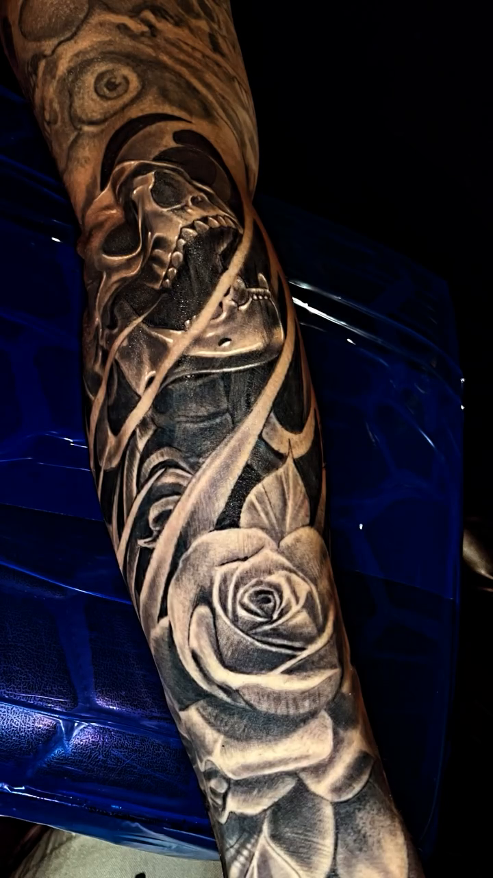 Grim reaper and roses sleeve dark art tattoo on the forearm by Monstro Ink Arts Tattoos, Bakersfield, California