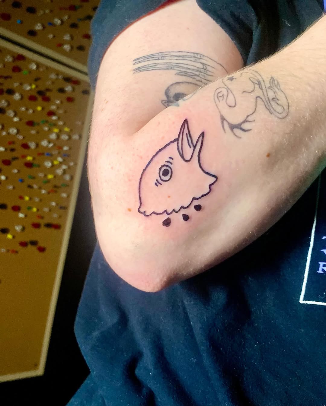 Cartoon fish head new school tattoo on the forearm by ollie, Portland, Oregon