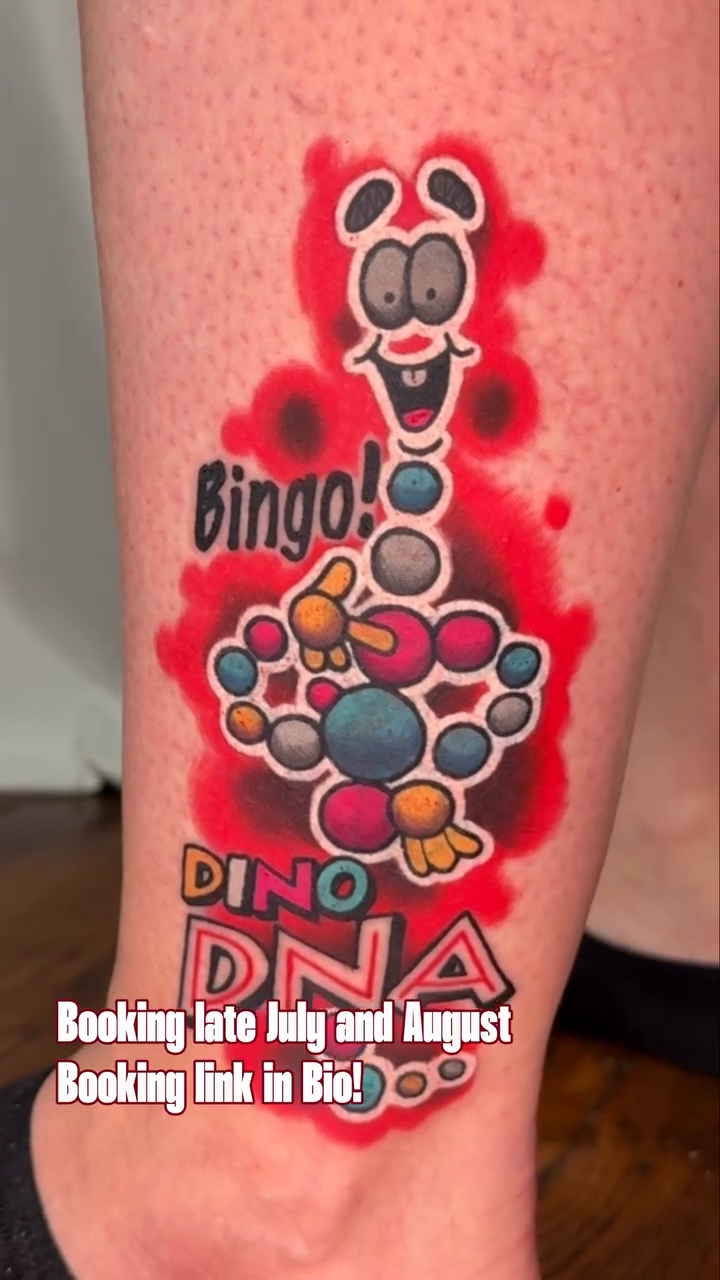 Bingo DNA character with colorful spheres new school tattoo on the leg by Kiel Ferrari