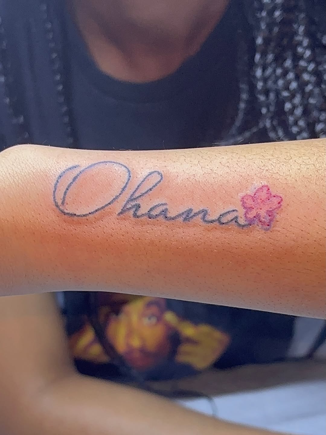 Ohana lettering with flower lettering tattoo on the forearm by GasPaccInk