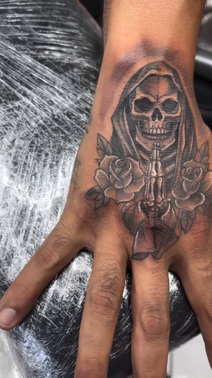 Realism tattoo on the hand by Shadows Tattoos