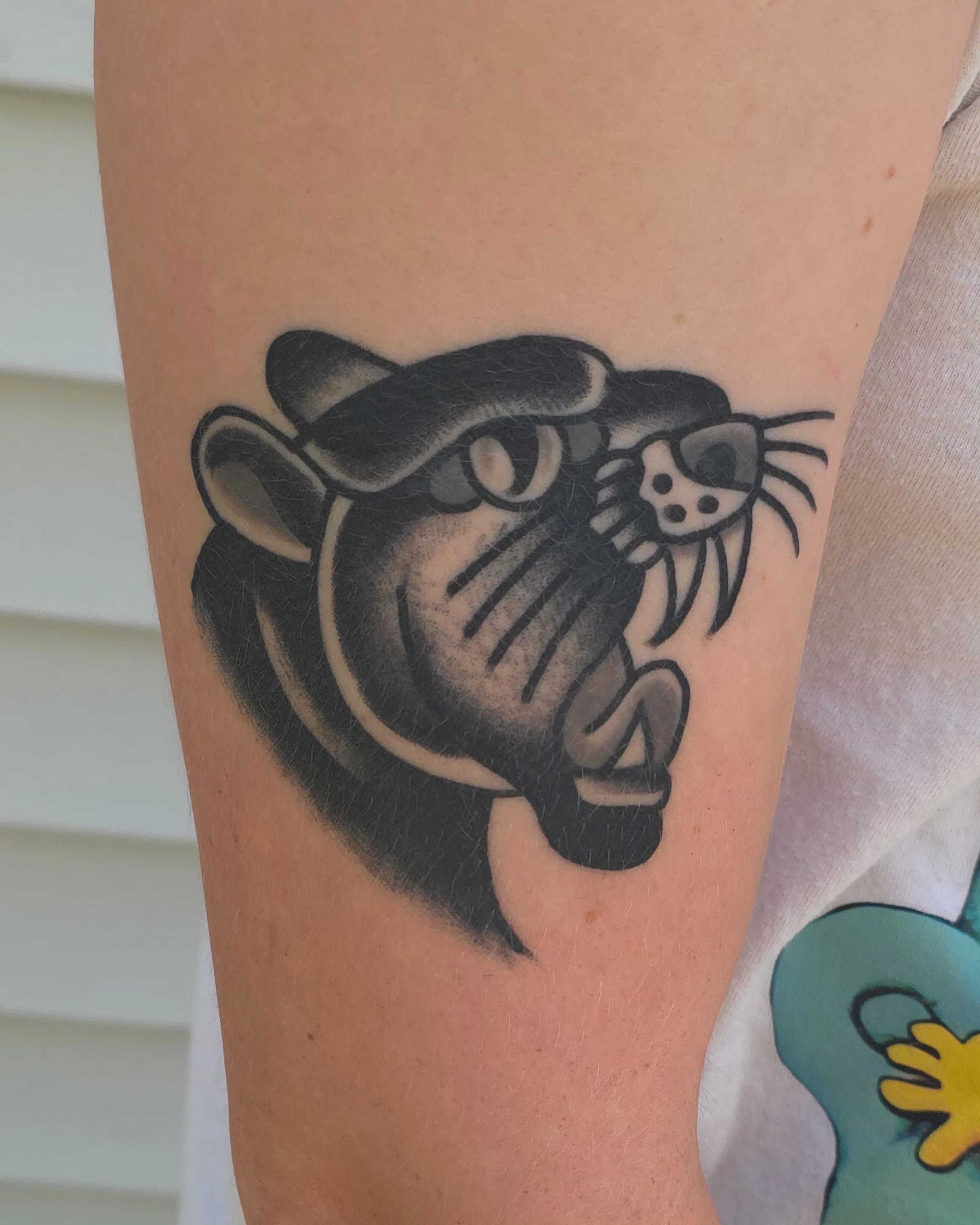 Panther black and grey tattoo on the forearm by J. Kirsch New Jersey Tattoo Artist